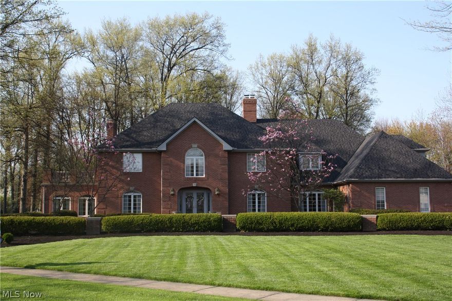 This all-brick six bedroom, four and one half bath colonial in prestigious Britannia Estates is, in a word, magnificent. Exquisite details, seldom found in newer construction abound in this luxurious home and include abundant natural woodwork, hand carvings, box-beam ceilings, Waterford fixtures, Palladian Windows, French doors, and custom built-ins. Functional highlights include a flowing floor plan, generous room sizes including an enormous master suite with his and hers closets and dressing room, rear staircase, a second floor laundry room, an in-law suite and whole house generator. The luxury continues outside with an oversized wooded lot, mature landscape, and high-end hardscapes including a bluestone terrace surrounded by a brick wall, a circular front drive, and separate service drive. A truly special home for the discerning buyer. See it today!