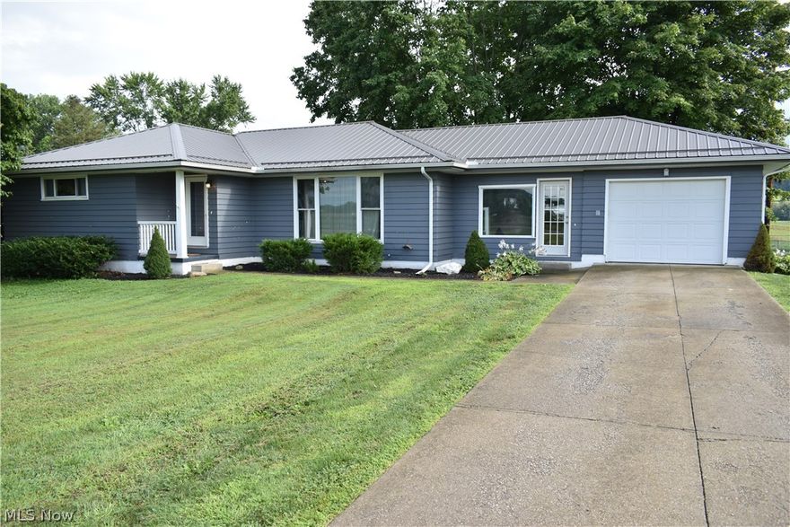 Nice 3 bedroom, 2 bathroom ranch home on over a 1/2 acre level lot in Ridgewood School District. On the main level is a living room, eat-in kitchen, the 3 bedrooms and a full bathroom, a breezeway with carpet and vented for heat and cooling and an attached 1 car garage. Off the back of the house is a trex floor and wood railing 30 x 18 deck as well as a small patio off the back of the breezeway. In the lower level is a family room as well as recreation area with a wet bar and built-in refrigerator.  There is a utility room as well as laundry area with toilet and sink.  Many updates in the last few years, metal roof, fascia, soffits, and gutters, new propane tank, central air, new water heater, flooring, updated bathroom and kitchen, deck, french doors. Call today to schedule a showing of this property.