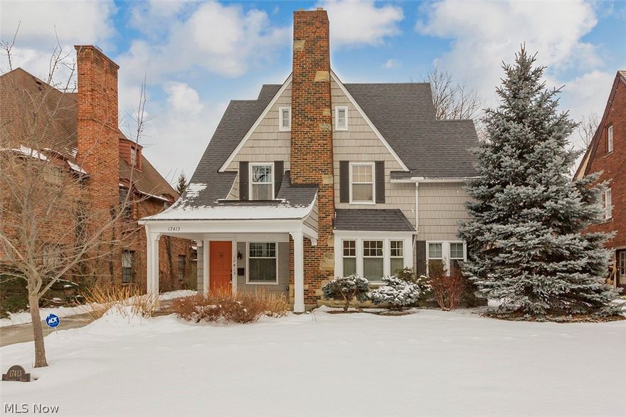 This charming Fernway colonial will wow you! The inviting front porch is perfect for reading, relaxing and sipping wine with friends. The first floor has a gracous living room with fireplace, custom built in cabinetry and bay window with window seat. There is a spacious family room on the first floor with beautiful cabinetry. The kitchen is updated with terra cotta flooring, custom cabinetry, all appliances and a sunny eating area. The formal dining room is open to the living room, kitchen and a 3 season porch. Apowder room is located inside the back door. On the second floor you will find a master suite with private bath and two other bedrooms and hallway bath. The third floor suite is amazing with a large bedroom and  full bath-perfect for teens, nannies and guests! The fenced in backyard is exquisite. The flower gardens and landscaping are mature and provide year long color. There are hardwood floors throughout, the windows are new, the driveway has been changed to concrete and the