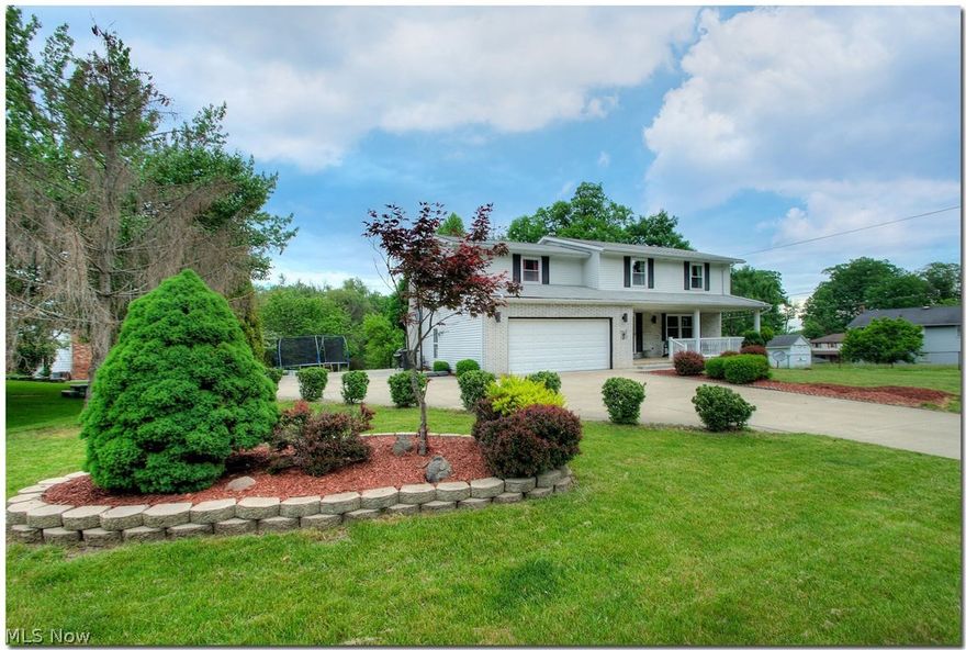 Gorgeous five bedroom colonial with a park like lot in a great area! This five bedroom, four bath beauty has updated kitchen and baths, stainless steel appliances stay, newer deck that overlooks a private scenic lot, spacious family room with fireplace, living room, dining room, and a full basement featuring rec room, laundry, and utility rooms. Boat or RV parking with an extra wide cement driveway. Sellers providing buyers with a one year HMS Home Warranty. Hurry on this one - it's nice - won't last...