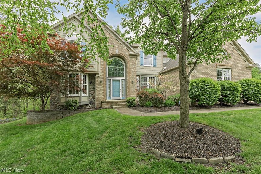 Exceptional Colonial nestled on a private wooded cul-de-sac in Eaton Estates close to the neighborhood swimming pool & tennis courts. The Kitchen is a knockout with custom wood cabinets, granite counters, stainless steel appliances, glass backsplash & wood floors. All appliances stay including a Jenn-Air gas range & Sub Zero refrigerator plus there's even a trash compactor. Kitchen has large eat-in area & there are sliders that lead outside to a wonderful screened sun porch with vaulted ceiling & skylights that overlooks the private, beautiful yard. Deck & patio at rear. Family Room has custom gas fireplace w/Amish built custom wood surround. First floor also boasts a first floor formal Dining Room, formal Living Room and Office with gas fireplace & bay window.  Upstairs is a huge Master Bedroom with vaulted ceilings and en-suite Master Bathroom with Amish custom built vanity with granite & double sinks. Soaking tub & shower in master bathroom plus his & her walk-in closets. Three addi