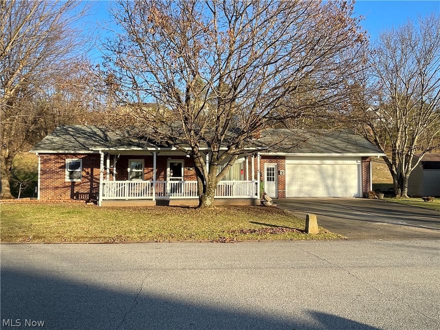 Location, location, location! Welcome to this beautiful all-brick ranch-style home located in Sunset Hills. Come and sit on this spacious front porch and enjoy hometown living at its finest.
This home boasts of 3 nice-sized bedrooms and a newly remodeled bathroom with a walk-in shower. The eat-in kitchen/dining room includes all appliances with a brand-new refrigerator. If it’s too cold for front porch sitting, snuggle up in the living room where you have a fireplace with a gas log hookup just waiting for those snowy nights. 
There's a full dry basement with an extra large shower, ample storage, and access to the backyard from the basement. The 2 car garage finishes out this gem. The current owner utilized some of the backyard space for gardening, but it could also be used for a flowerbed or a place for your family cookouts
This maintenance-free home has been loved and well cared for and is just waiting for you to enjoy. Schedule your showing today!
