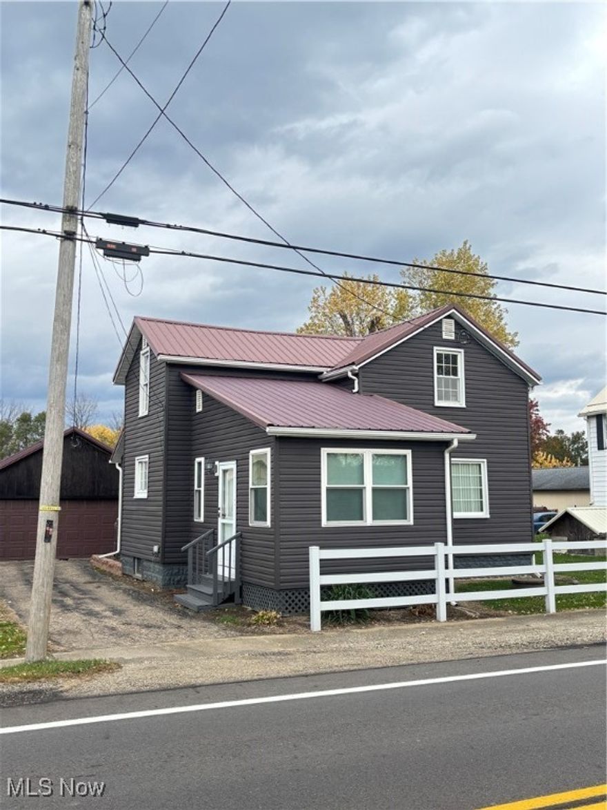 Come take a look at this ready to move in home with a shop! Located on a state route convenient to Dover and major routes. Lots of updates including metal roof, replacement windows, new water softener system and pressure tank. Well and septic already tested and county approved. Set up for standby generator. Large shop with a small office, waste oil heater, 220 electric, and natural gas hookup. Outdoor pavilion with gas hookup for grill. Fenced in yard. Access from front and back of property.