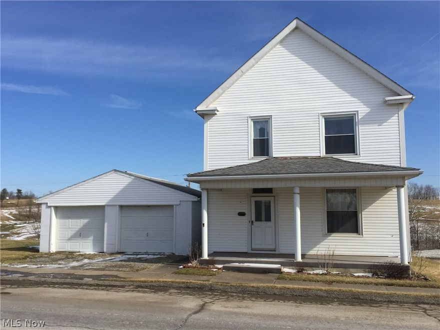 Wow! Very nicely updated & tastefully decorated 2 story home with replacement windows, newer flooring, paint, vinyl siding. 3 beds plus an extra room for den/family room. Very large updated full bath on second floor plus half bath on first floor. This home has room to grow. Large deck off rear of home and garage. Detached 2 car garage. Mineral rights are leased and will be retained by seller. HOME WARRANTY!