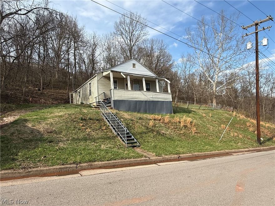 Great investment opportunity. These city lots (4 parcels equaling approximately 0.73 acre) features an existing structure that will require extensive renovation or possible removal. Perfect for investors, builders, or anyone looking to start fresh with new construction. Convenient location close to town amenities. Property being sold as is.