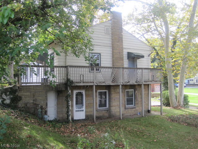 Looking for a great opportunity to generate additional income. Don't miss seeing this Portage Lakes 4 unit apartment building. Located in the heart of the Portage Lakes Community. Sits on a corner lot with great views of the lake. Each unit has an eat in kitchen, living room, bedroom and bathroom. Tenants pay for their own gas and electric. Owner pays sewer, trash and outside electric.