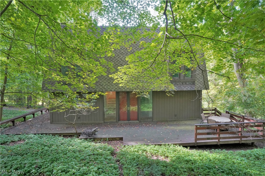 Looking for your own nature retreat, but still close to everything?!?! Looking for a winter project where the hard part is done & fun part is ready to begin?! This may be the property for you! Unique 1824 sqft Modern Colonial on 2.6 acres of woods has ultimate privacy, yet 2 min from State Rd! Land backs up to Cuy. River (which you can see in the winter) & Babb Run, has multiple kinds of wildlife for your gazing & feeding pleasure. The house has been redone from top to bottom, includg but not limited to new roof w/copper flashings & gutters/metal vents & new wood, furnace, central-air, insta-hot H20, custom made floor-to-ceiling windows on 1st fl w/wiring for future electric shades, new Pella triple-pane windows upstairs, all new wiring includg ceiling speakers w/7.1 sound system in walls & 45 LED can lights, new plumbg, beams re-inforced, wall removed, kitchen being relocated to add viewing area, TOTO wall-hung toilets, all gutted & new drywall w/level 5 finish, nature stone on LL & g