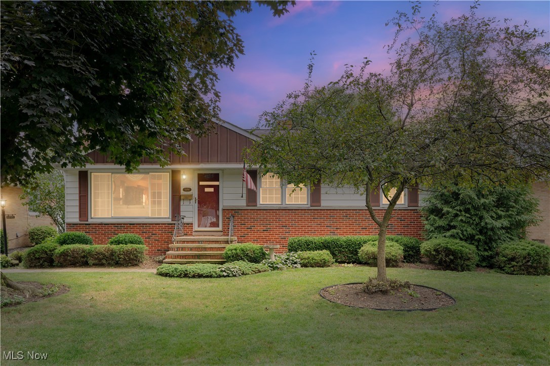 Welcome to this well maintained and move-in ready family home! This classic home offers three generously-sized bedrooms (one with built-in shelving and another with a hidden closet—perfect for extra storage or a fun surprise). The spacious kitchen offers ample cabinetry, walk-in pantry, and brand-new dishwasher (2025), along with a convenient wall oven and cooktop. The open-concept living and dining area is anchored by an elegant brick fireplace combining traditional craftsmanship with a modern gas insert—a timeless focal point for the space. Additional pantry off of dining room. Vinyl windows (2005) radiate an abundance of natural light throughout the home. The updated bathroom includes a modern shower surround and newer toilet. Downstairs, a spotless basement offers a finished rec room and additional space ideal for a workshop, playroom, or home gym. The furnace (approx. 2015) and updated electrical panel provide added peace of mind. Step outside to a beautifully landscaped backyard enclosed by a new vinyl privacy fence with mature perennials enhancing the landscape. The large, covered patio is ideal for both relaxing and entertaining. A detached two-car garage with updated electrical completes this turnkey property. Roof (approx. 2010). All of this in a highly desirable neighborhood—short walk to Big Creek Parkway Trail and Reservation, Forest Elementary, and Greenbriar Jr. High!