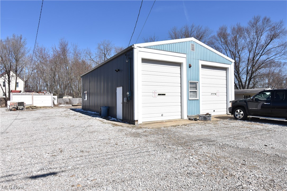 Commercial building in Ashland! Spacious two car garage. Cement floors and very well lit. Gravel drive. Additional garage on property. Heated office and bathroom.