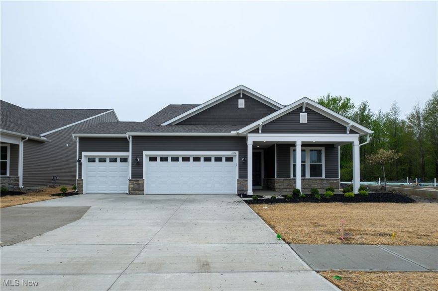 Move-In Ready Mystique ranch home available NOW in Del Webb!  Enjoy the resort-style amenities and low maintenance living while enjoying the innovative open floor plan of the popular Mystique.  This home offers a 3-car garage AND 150 square feet of storage!  Walk into this gorgeous home from the front porch where you can enjoy your morning coffee.  The Mystique boasts a great deal of natural daylight with large windows.  The kitchen has the WOW factor with beautiful quartz countertops and upgraded cabinets.  Enjoy the stainless-steel built-in appliances while cooking your favorite meals.  The owner’s suite bedroom is oversized and enjoy relaxing in the spa-like bathroom.  The most wonderful feature of this home is it’s view of the plush trees while sitting out on the rear extended patio.  Call now for a viewing!