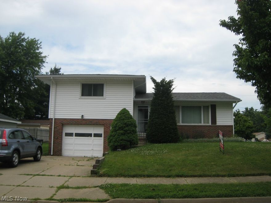Nice and cozy split level perfect for first time home buyers. The kitchen was completely remodeled in 2011 with Kraftmaid soft-close cabinets and includes all new Whirlpool Gold appliances. New Carpeting in 2011, roof in 2008, and windows in 2006. You will find double closets in the MBR. Priced to sell fast. Don't let your dream home pass you by!