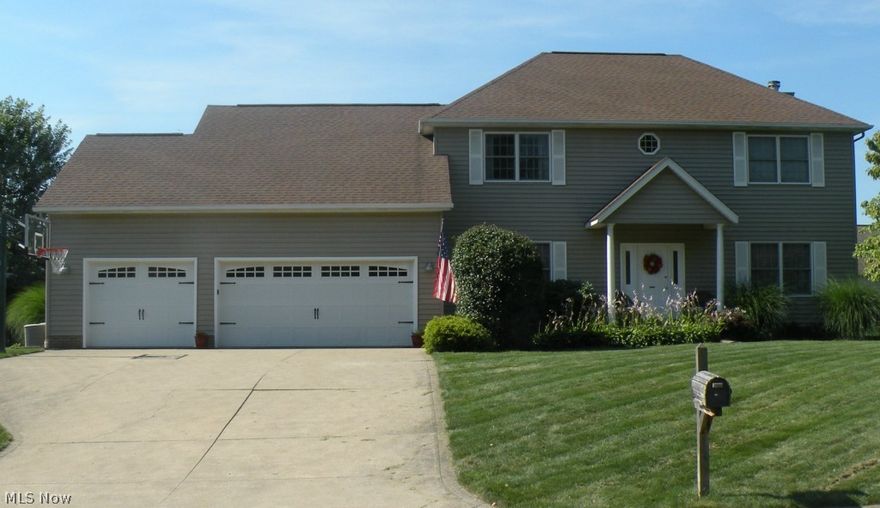 Beautiful 4 bedroom home located in desirable Deer Trace Subdiv. Offers many new updates and a spacious open floor plan! The large kitchen has maple cabinets and new Quartz counter tops & backsplash. All new floor covering throughout. Mechanicals & roof 2010-2012. Other amenities include over-size laundry & pantry, whole house water filter, &  radon mitigation system. Finished lower level and lovely sunroom overlooking fenced in backyard.