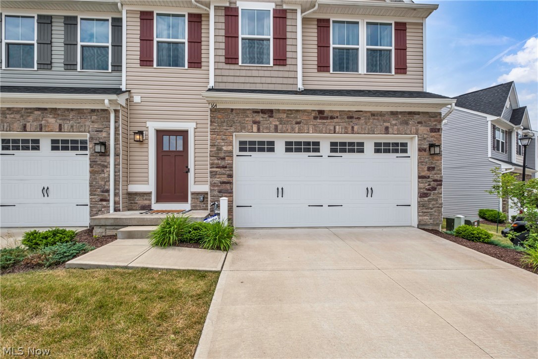 Welcome to this newer end unit townhouse, just minutes from historic Medina Square. This charming home features 3 bedrooms, 3.5 bathrooms, and a range of modern updates. The main floor boasts new LVP flooring and an open concept layout. The kitchen is equipped with white shaker cabinets, stainless steel appliances, and a large deck off the kitchen, perfect for summer evenings. A half bath on the main floor adds convenience. Upstairs, you’ll find three bedrooms and two full bathrooms. The master suite includes double vanities and double closets. The laundry room is also conveniently located upstairs.
The finished basement offers extra living space with another full bathroom, ideal for a rec room or guest space. An attached 2-car garage provides secure parking and storage. Enjoy maintenance-free living with all landscaping and snow removal included. This home is perfect for those seeking comfort and convenience in a great location. Don’t miss this opportunity! Schedule a showing today and make this beautiful townhouse your new home!