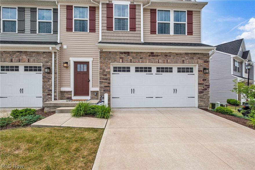 Welcome to this newer end unit townhouse, just minutes from historic Medina Square. This charming home features 3 bedrooms, 3.5 bathrooms, and a range of modern updates. The main floor boasts new LVP flooring and an open concept layout. The kitchen is equipped with white shaker cabinets, stainless steel appliances, and a large deck off the kitchen, perfect for summer evenings. A half bath on the main floor adds convenience. Upstairs, you’ll find three bedrooms and two full bathrooms. The master suite includes double vanities and double closets. The laundry room is also conveniently located upstairs.
The finished basement offers extra living space with another full bathroom, ideal for a rec room or guest space. An attached 2-car garage provides secure parking and storage. Enjoy maintenance-free living with all landscaping and snow removal included. This home is perfect for those seeking comfort and convenience in a great location. Don’t miss this opportunity! Schedule a showing today and make this beautiful townhouse your new home!