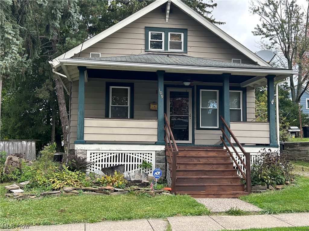 This affordable, spacious 2 bedroom, 1 bath home has been well loved and maintained throughout the years. One car garage, all vinyl tilt-in windows minus two, central air, newer wood blinds, large master bedroom closet, gas heat, leaf guards, and city utilities are nice features to this fully insulated home. Professionally updated bath offers an expensive pedestal sink, a deep bathtub with a complete tiled surround. You will appreciate the one-of-a-kind unique wood-design patterns in just the right places of this home. A sturdy home with charming features. All mechanicals are in good condition. Stove and laundry areas offer gas or electric option. One bedroom up and one bedroom down makes privacy easy. Window seat in living room with formal dining room that's handy to the kitchen. Large covered front porch and back wood deck were made for relaxing. Three outside spigots and six outdoor electrical plugs are very handy. A very clean home with nice hardwood flooring all through the first floor. Transferable Ohio State fully-waterproofed basement offers more usable space for additional living options, if desired. Immediate possession for enjoyable Holiday entertaining.