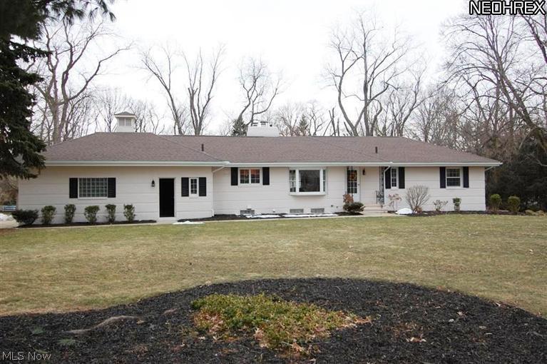 True gem in Fairlawn Heights! This remarkable ranch has been totally updated from head to toe, offers a 4 car garage & 1.3 acres with an outbuilding that's more like an entertainment center! All updates are as recent as October, 2013 & include: an amazing kitchen with Kraftmaid maple cabinets/drawers, crown molding, pantry, stainless steel appliances, glass backsplash, granite counter tops, tile flooring & large eating area. Redesigned master suite features 6 x 10 walk in closet, sitting area, & full bath with claw foot soaking tub, walk-in shower & double sinks. Fabulous refinished hardwood floors accent the entryway, formal dining room & living room with woodburning fireplace. Additional home improvements include the roof, chimney, electric, plumbing, 2nd full bath, carpeting, fresh paint & more. Basement is spacious & clean. Capture the beauty of this property from the expansive all season sunroom then step outside to enjoy the stamped concrete patio & gorgeous backyard.