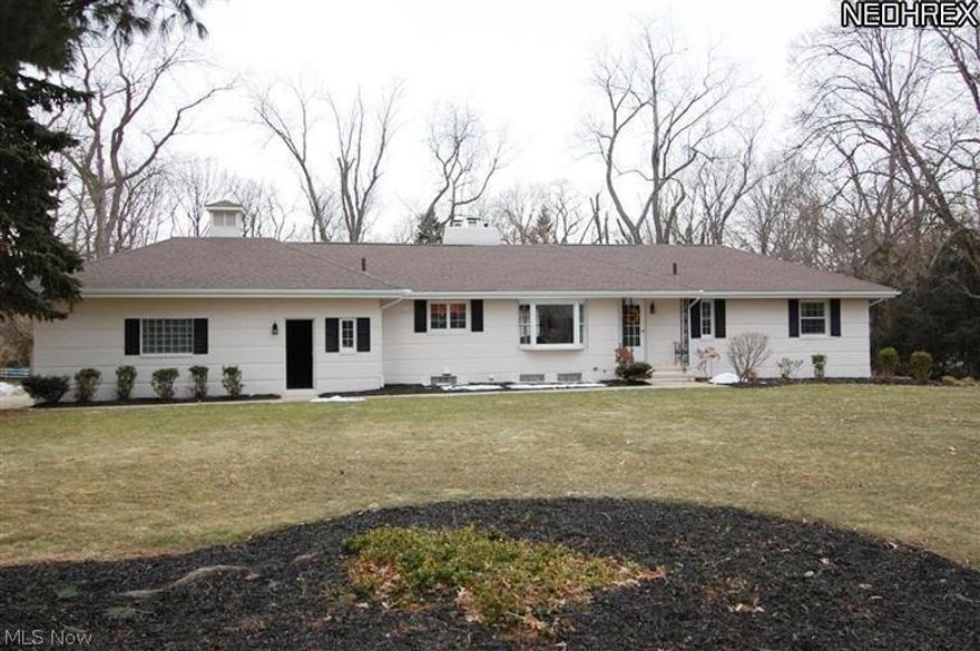 True gem in Fairlawn Heights!  This remarkable ranch has been totally updated from head to toe, offers a 4 car garage & 1.3 acres with an outbuilding that's more like an entertainment center!  All updates are as recent as October, 2013 & include:  an amazing kitchen with Kraftmaid maple cabinets/drawers, crown molding, pantry, stainless steel appliances, glass backsplash, granite counter tops, tile flooring & large eating area.  Redesigned master suite features 6 x 10 walk in closet, sitting area, & full bath with claw foot soaking tub, walk-in shower & double sinks.  Fabulous refinished hardwood floors accent the entryway, formal dining room & living room with woodburning fireplace.  Additional home improvements include the roof, chimney, electric, plumbing, 2nd full bath, carpeting, fresh paint & more.  Basement is spacious & clean.  Capture the beauty of this property from the expansive all season sunroom then step outside to enjoy the stamped concrete patio & gorgeous backyard.