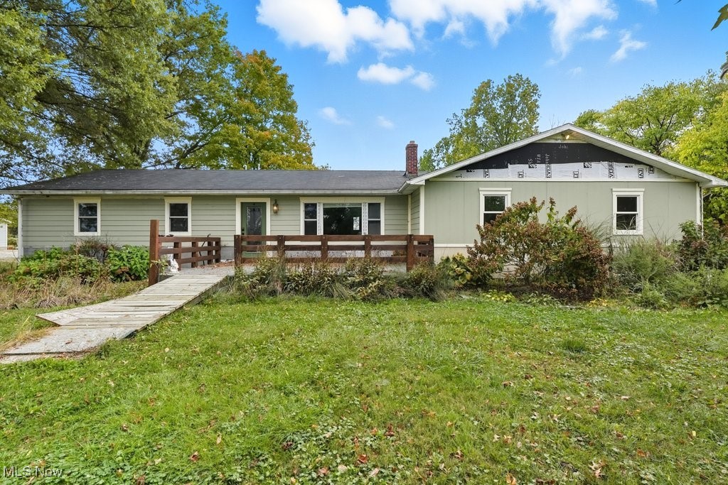 Put your finishing touches on this ranch on almost 2 acres of land with a 1,300+ SF outbuilding and 2 car attached garage. A nice open floor plan with a spacious kitchen and island flowing into the family room, dining area and leading to a sun room. 3 bedrooms and 2 full baths. One of the bathrooms does need to be finished.