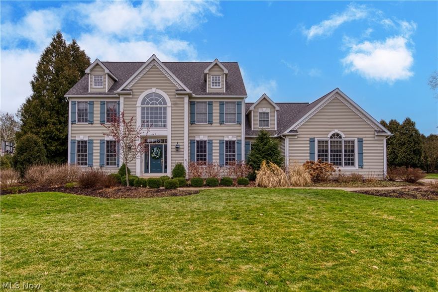 Welcome to this updated Beres built Colonial in the very desirable Ridgewood Lakes neighborhood. Upon entering the two-story foyer, you are greeted by beautiful hardwood floors and an abundance of natural light. The gorgeous eat-in updated kitchen with views of the two-tiered deck and backyard has newer S/S appliances, Cambria quartz countertops, gray subway tile backsplash, built-in wine fridge & white cabinets. The oversized island features additional seating and a 5-burner cook-top. Spacious family room is open to the kitchen and features a charming gas fireplace and access to the deck. The formal dining room with wainscoting and tray ceiling provides the perfect place for family meals and holiday gatherings. Just off of the foyer is the living room with two large windows and newer carpet. Home office with custom built-ins, large laundry room and a half bath round out the 1st floor. The massive owner's suite with double door entry showcases vaulted ceilings, sitting room and large w