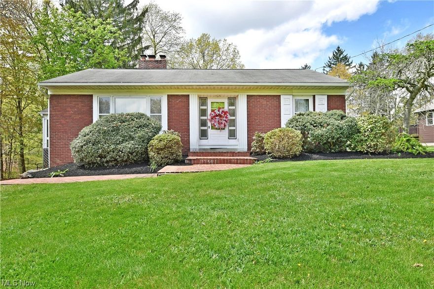 Welcome to this cozy home nestled back in almost 4 acres of woods bordering Meander Reservoir.  The entry way into the home boasts a beautiful fireplace in the family room leading you into the dining area off of the kitchen and an entrance way into your enclosed patio  overlooking your wooded hollow and all of the nature it holds.  There is a first floor laundry off of the kitchen for your convenience. 3 bedrooms also on the main floor with one being a master with master bath and  its own personal access to the oversized deck. The Master has two full closets for plenty of extra space and the newly remolded bathroom is a sight to see.  Stairs leading to another family room with a second fireplace and access leading out to the driveway or into the garage completes this homes charm.  Schedule a showing now before its gone.