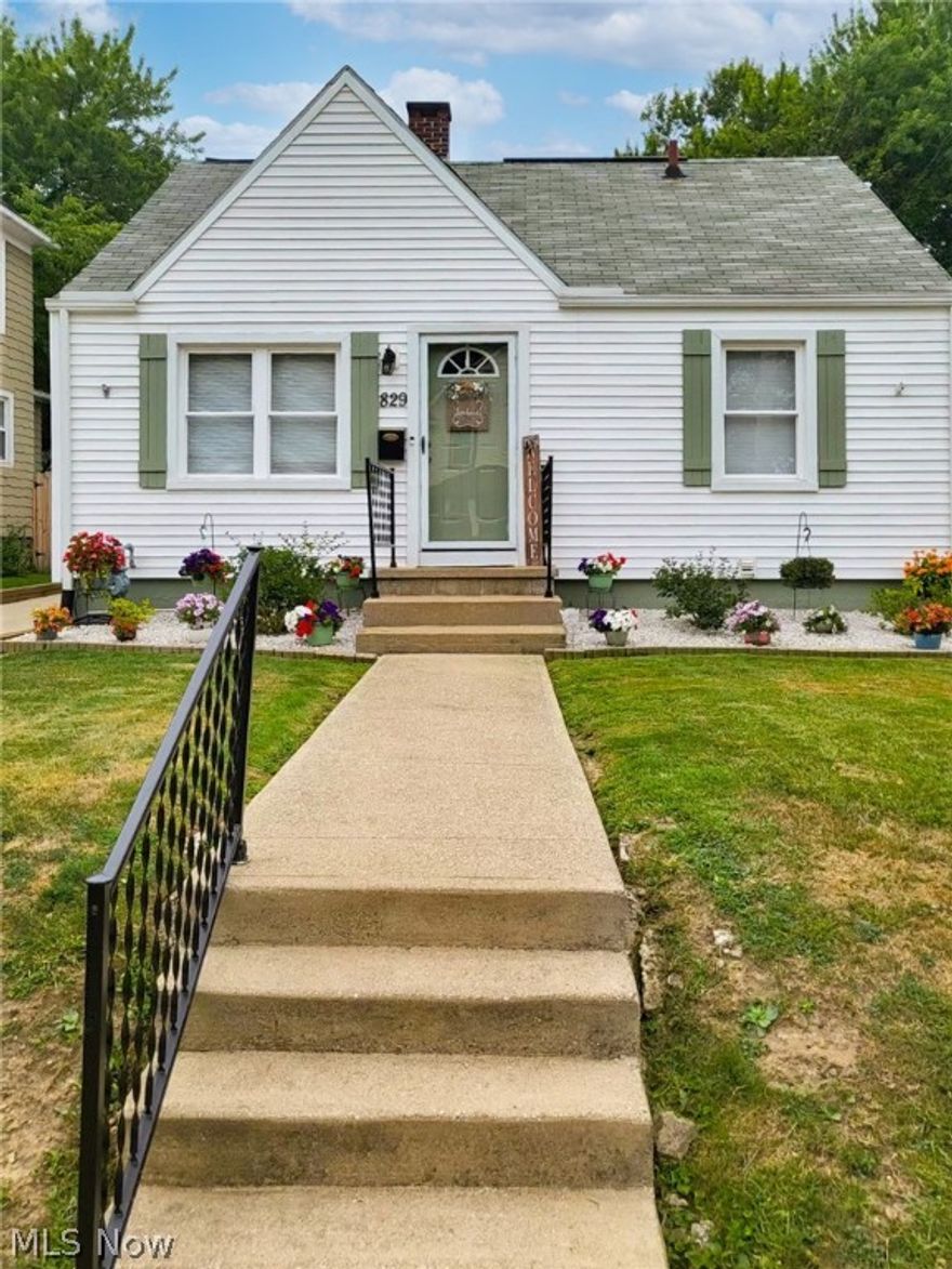 Adorable ranch that is completely updated and meticulously maintained.  New kitchen with soft close cabinets, granite countertops, water/scratch resistant floors, stainless appliances.   All rooms and trim freshly painted in 2021. Central Air added in 2018, Concrete driveway and patio in 2018. New siding in 2019, new roof on the sunroom in 2022. Trees removed and others trimmed back in 2022.  Privacy fence, landscaping and motion lights added.  Hot water tank 9/2022, living room carpet 2021, electrical outlets and switches replaced in 2021. Full basement offers a ton of storage and an extra room that could be used for multiple purposes.  Basement has a 1/2 bath and an added full standing shower.  Walking distance to the high school and YMCA. Quick 5 minute drive to Mount Union College. This is a must see!!
