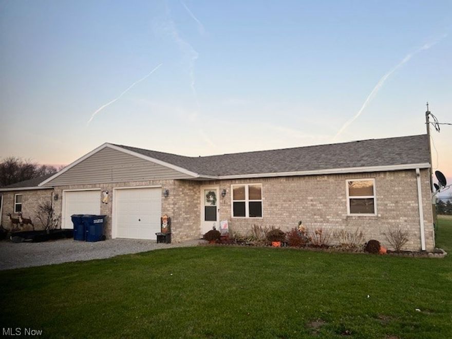 Crestview duplex on 2.46 acres! In this custom-built duplex, each unit features an open living room and dining room that leads to the kitchen.  Off the dining room are sliding doors to the concrete patio, outdoor storage closet and beautiful views!  There are 2 bedrooms, 1 full and one-half bathroom with laundry.  Each unit has a separate garage and parking spaces.  The roof was replaced in 2022.  Great opportunity for an owner-occupant or investor!