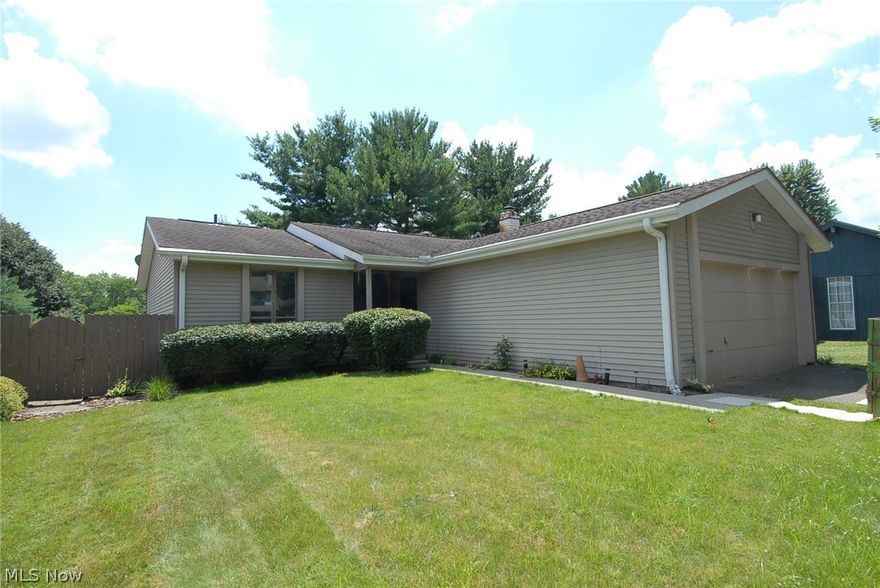 Charming patio home with may recent updates.  New flooring on the first level and lower walkout family room, interior painting, lighting, bathroom vanities, toilets, kitchen appliances, and kitchen back splash.  New garage door to be installed.  Garage door key pad.  Finished basement has a kitchenette, laundry room, storage room, potential third bedroom with sliding doors to the fenced in back yard.