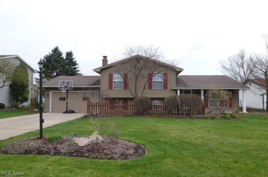 Great curb appeal for this three bedroom split level home. Spacious interior including kitchen/dinette, family room with wood burning fireplace, and 2 1/2 car attached garage. Backyard has a 18x36 in ground pool with updated heater, filter, liner, and cover. All electric heat with a 80 gallon hot water tank.