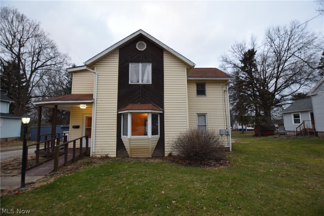 Welcome to 249 Lake Street! This 4-bedroom, 2-bathroom home is located in Kent with convenient access to Kent State University’s campus as well as the downtown area. The roomy entry way has vinyl wood plank floors and a bench for taking off or putting on your shoes – a great way to keep the carpets clean! Open floor plan between living room and dining area. The kitchen has ample amount of storage space – lots of countertop and cabinets! Full bathroom located off the kitchen. Three large bedrooms and a full bath located upstairs. Bonus room located at the back of the house offers even more living space. This room has access to outside, as well as a full-size closet. New washer and dryer (2019). Home has ramps leading to both the front and back doors.