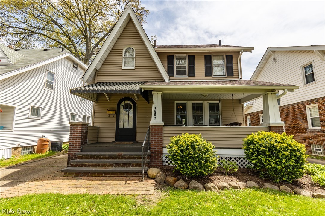 Welcome to this charming Colonial home in Akron! The front has a nice porch swing to sit on and enjoy these wonderful spring days with a book. The living room has tons of windows to allow the natural light to shine on the beautiful fireplace. Off the living room is the dining room which has two large windows, chair rail molding that brings an elegance to this room. The dining room also has French doors to lead to a huge deck. The kitchen has all stainless steel appliances and white cupboards to accent the counter tops. The kitchen has a new fridge and stove! Also do not miss that darling breakfast nook! Stunning flooring through the first floor. Three nicely sized bedrooms all with hardwood floors! The attic area would make for a great extra space for an office. The basement is finished with a full bathroom, this would make for the perfect family room! Do not miss out on this stunning home!
