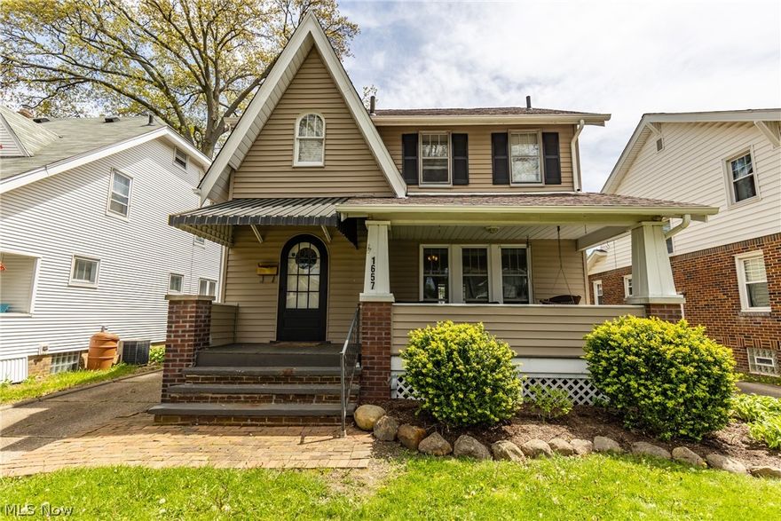 Welcome to this charming Colonial home in Akron!  The front has a nice porch swing to sit on and enjoy these wonderful spring days with a book. The living room has tons of windows to allow the natural light to shine on the beautiful fireplace. Off the living room is the dining room which has two large windows, chair rail molding that brings an elegance to this room.   The dining room also has French doors to lead to a huge deck. The kitchen has all stainless steel appliances and white cupboards to accent the counter tops. The kitchen has a new fridge and stove! Also do not miss that darling breakfast nook! Stunning flooring through the first floor.  Three nicely sized bedrooms all with hardwood floors! The attic area would make for a great extra space for an office. The basement is finished with a full bathroom, this would make for the perfect family room!  Do not miss out on this stunning home!