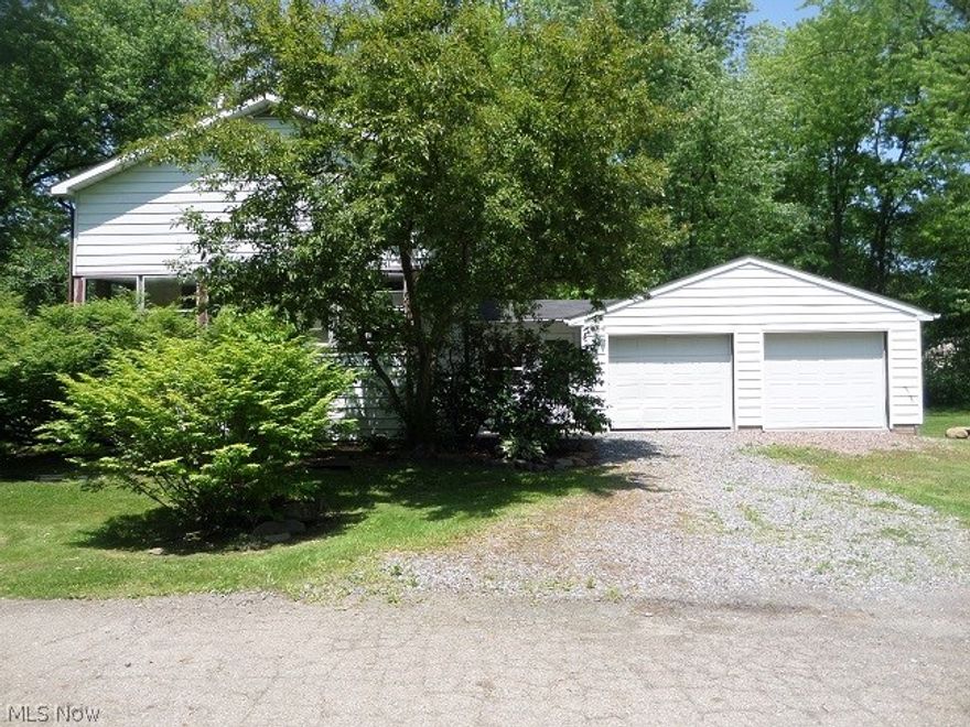 Cute as a button! Beautiful yard with flowering shrubs all around. This home is located at the very end of the street with 4 additional parcels! Four of the lot's have 30 foot of frontage and the 5th lot has 33 feet of frontage. There is a huge room upstairs that would make a great master suite! While you are up there looking PLEASE do not go into the closet  (floor looks weak). Open kitchen, large living room with fireplace, formal dining room that has sliding glass doors that lead to a brick patio. The first floor bathroom is very cozy and updated! Two bedrooms on the first level! Basement does have mold. Please do not stay down there long. This home has so much potential for the price! Some updating needed! Great place to call home!