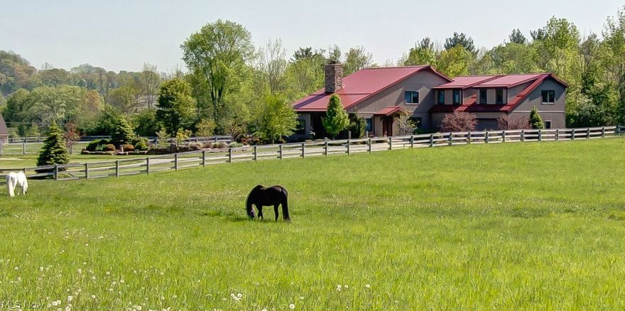 Rare opportunity to own idyllic multiple dwelling equestrian compound (2 homes, one 23 stall stable/barn, indoor arena, etc.) on 19+ acres with DIRECT access to 3000 acre Hinckley Reservation with 11+ miles of park bridle trails for any riding discipline. This 23 stall stable has StableComfort flooring system, automatic heated waterers, 23 lockers, and a hay loft with grain room and unique grain and hay drops. There is a 120 x 70 sq ft sand-based indoor riding arena with covered walkway and heated riders lounge and viewing area; an outdoor riding arena; four (4) large pastures; two (2) all weather paddocks with 440 Fencing; a hay and sawdust storage building; and a large equipment building. The 4018 sq ft custom Main Home built in 2005 is an extraordinary refined western style colonial with open floor plan, virgin timber beams, reclaimed wide plank oak floors, slate flooring, radiant floor heating, screened porch with fireplace, 2-Story Great Room with Rumford Fireplace, eat-in kitchen