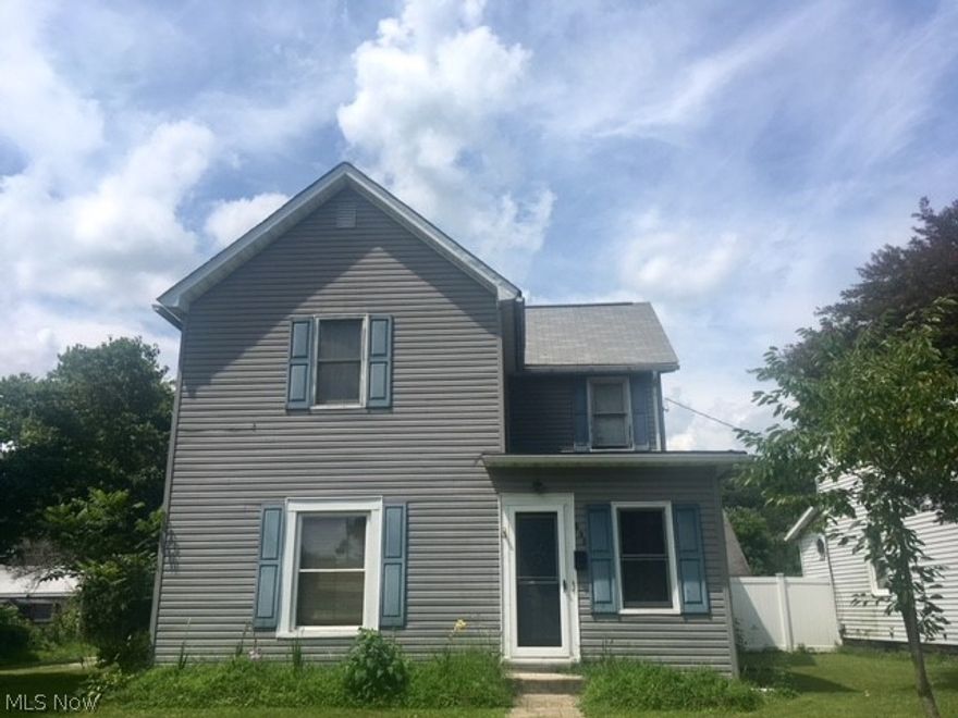 Vinyl sided 4 bedroom, 1 bath home. Open kitchen with breakfast bar and wood burning stove. Living room, dining room and first floor laundry. Detached heated garage and storage shed. Nice 63x245 lot with privacy fence, above ground swimming pool, gazebo and tiki bar. This home will allow for immediate possession.