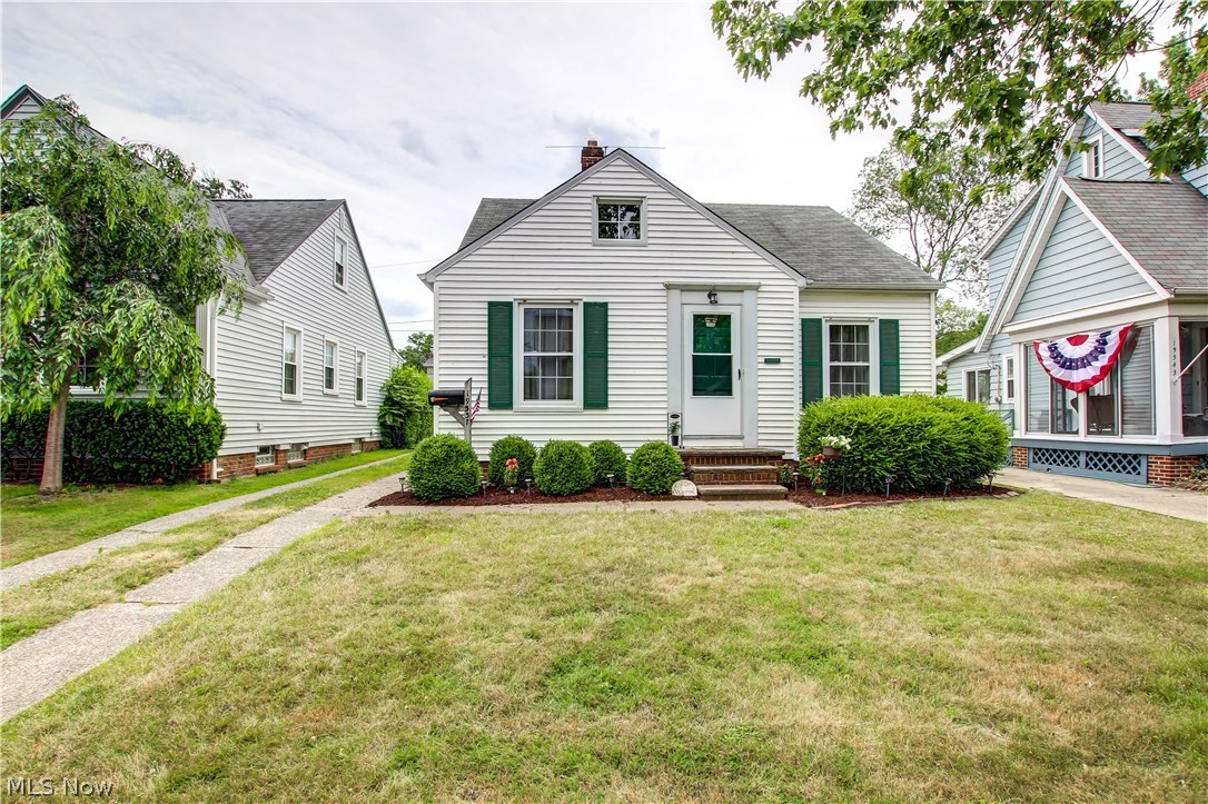 Updated 3 bedroom Rocky River bungalow in the desirable Library District. The kitchen features new granite counters, new sink, and new vinyl flooring. All appliances stay. Charming dining room with a built-in hutch. The newly finished basement adds an additional 400 sq ft of living space, ideal for entertaining or for the kids. New windows in the entire house, including glass block in the basement. The 2nd floor bedroom is generously sized and offers plenty of storage space. Modern bathroom with tile floors. Freshly painted in today's colors. Hardwood floors and natural woodwork throughout. Seller offering a 1 year home warranty. Fantastic location, near Whole Foods, Rocky River Library, Shops, Restaurants and Rocky River Middle School.