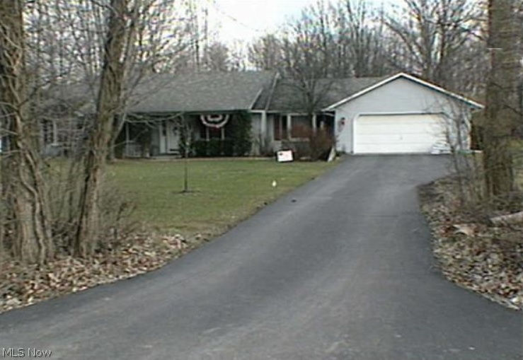 Dream of a home on a wooded acre lot? Well, here it is. Spacious country ranch, bay windows to view nature and quiet country. Large laundry room with loads of space for extra storage. Crown molding and lovely woodwork through-out. Enjoy this open style ranch with a formal dining room plus a breakfast bar in the kitchen. Master bedroom boasts a large walk-in closet and master bath with a Jacuzzi tub and a shower.