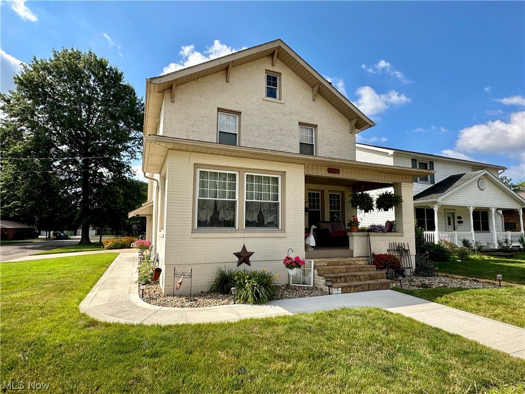 Beautifully updated 2 story Brick / Stucco home in a desirable location. 3 bedrooms, 2 full bathrooms and tasteful quality updates throughout the home. The kitchen has newer appliances, custom granite countertops and backsplash, oak cabinets, and gorgeous hardwood flooring. Large open rooms with newer flooring, wide original hardwood baseboards, door casings, and coved ceilings to show off the historic nature of the home. Gas fireplace in the living room, and a large sunroom on the front of the house. Main floor laundry and an updated full bathroom right off of the kitchen. 3 bedrooms upstairs with ample storage and access to the attic by staircase. The 2nd floor bathroom was just remodeled with a walk in granite-look shower, updated vinyl flooring and a beautiful quartz vanity with integral lighting. Head down stairs to the mostly finished basement with new drywall and tile flooring. Equipment room on the other side has a work bench, storage area and the major components of the house