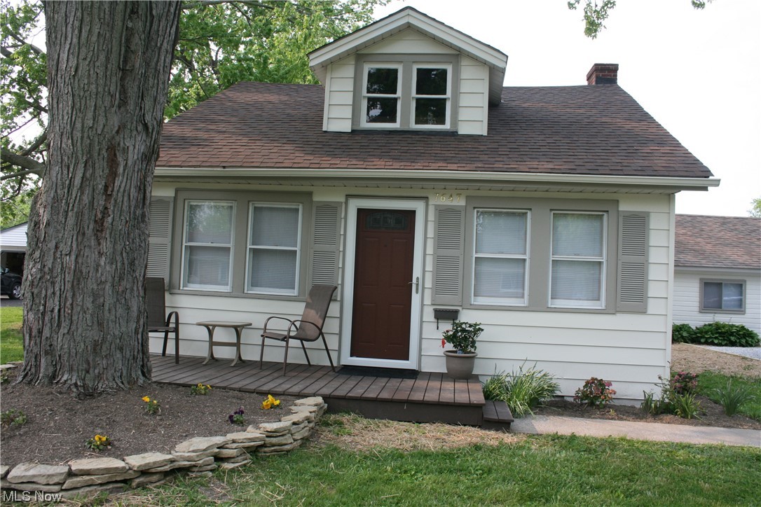 This cozy bungalow 3B,1BA offers comfortable 1 floor living. Updated w/ flooring and fresh paint. The bath has a new tub/shower combination & vanity. Kitchen makeover includes butcher block countertops, subway tile backsplash & stainless steel appliances. Dining nook has ceramic tile & large windows. The laundry room has vinyl plank flooring, stackable washer/dryer. New furnace, exterior paint & shingles. Enjoy the front porch or the back deck with a fenced yard. Detached 1-car plus garage.