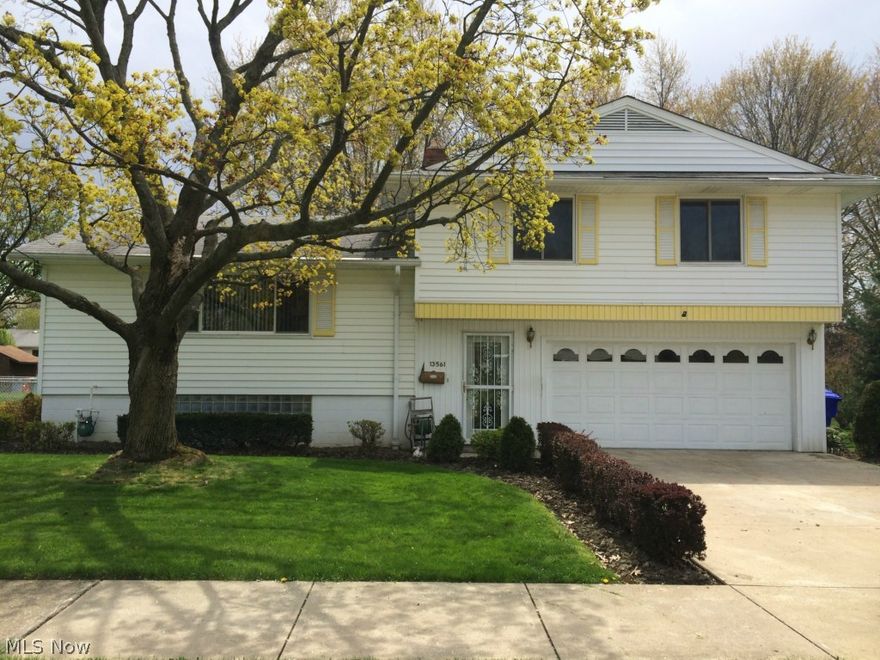 Fantastic three bedroom, one and half bath, split-level. With large living room, Eat-in-kitchen, formal dining room and lower level family room. Beautiful fenced backyard with stamped patio, grape vines and outbuilding. Comes with refrigerator, Range, microwave and dryer.