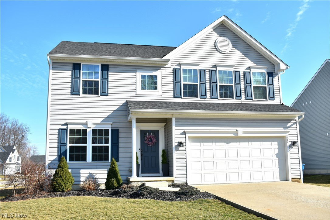Spacious, one-of-a-kind colonial home located in the desirable Amherst School District. Built in 2015, this modern residence boasts 4 bedrooms and an additional room in the basement, ideal for a guest room or office. The foyer welcomes you with hardwood floors, leading to an open floor plan featuring an inviting family room with a cozy gas fireplace, well-lit living and dining room, and an L-shaped kitchen that features a walk-in pantry, 42” maple cabinets, newly installed farm house style sink, a breakfast bar, and gourmet island – perfect for entertaining. The laundry room is conveniently located on the second floor. The main bedroom and bath, along with three additional bedrooms, complete the second floor. The basement rec room and 1st-floor family room both feature surround sound speaker systems. Outside, enjoy a large backyard on this corner lot home on a quiet cul-de-sac. For added enjoyment and privacy, the Timber Tech composite wood privacy fence and deck were both installed in 2023. Other recent updates include new carpet in stairways, upstairs landing, and bedrooms (November 2022). New basement carpet; freshly painted bedrooms, basement, and 1st floor; and radon mitigation system were all completed in 2023. The neighborhood offers a community pool and clubhouse. Centrally located near stores, restaurants, and easy access to main highways. Do not let the sellers’ unexpected out-of-state relocation pass you by! With its timeless design, modern amenities, and prime location, this 4-bedroom colonial in the Amherst school district is truly a wonderful place to call home.
