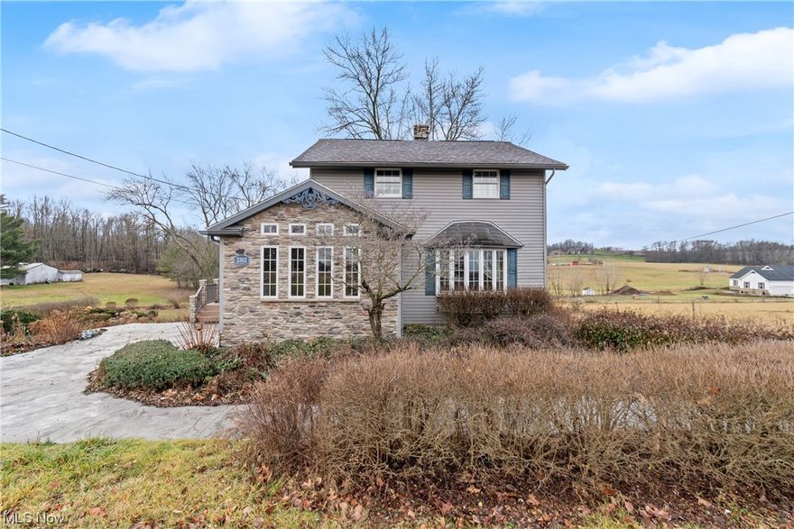 Nestled on a sprawling 2-acre lot in a tranquil rural setting, this exceptional property offers a unique combination of modern amenities and eco-friendly features. The highlight of this home is its solar panels, which not only provide sustainable energy but also offer Solar Renewable Energy Certificate (SREC) credits. These credits can be sold to utility companies, providing an additional source of income for the homeowner. Step inside and be greeted by the warmth and elegance of this well-designed home. The main level offers hardwood floors throughout, adding a touch of sophistication to the living spaces. The open floor plan seamlessly connects the living room and dining area creating a perfect space for entertaining guests or spending quality time with family. This property also offers a bonus room, which can be used as a home office, playroom, or additional bedroom. The possibilities are endless! Additionally, there is a partially finished walkout basement that provides extra space for storage or can be transformed into a recreational oasis. Outside, the expansive 2-acre lot offers plenty of room for outdoor activities and provides a sense of privacy and serenity. Enjoy the beauty of nature, with space for gardening, outdoor entertaining, or simply enjoying the peaceful surroundings. With its solar panels, SREC credits, three bathrooms, bonus room, partially finished walkout basement, and hardwood floors throughout, this property offers a perfect blend of sustainability, comfort, and versatility. It presents a rare opportunity to embrace a rural lifestyle while enjoying modern conveniences. Don't miss out on making this extraordinary property your new home!