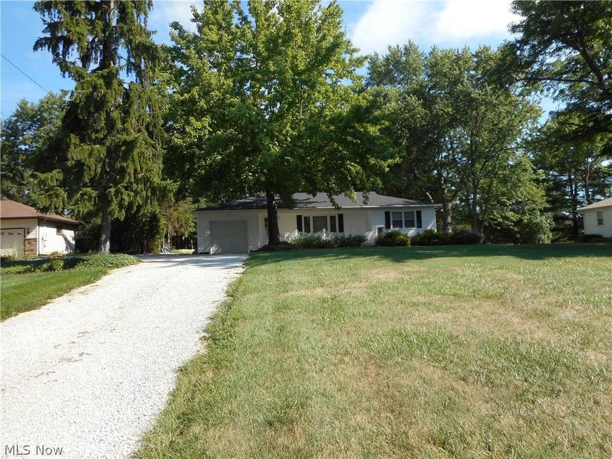 Move in ready. A beautiful 3 bedroom ranch. Brick  fireplace that was totally redone inside and out in 2015  in the cozy  family room.  Ceiling fans in Dining room, Guest bedroom and  Master bedroom that has double closets.  This home has Plaster walls (Not Drywall). Hardwood floors thru-out home except in Family room and guest bedroom.  Everything has been updated including septic system in 2016. Had basement waterproof in 2010. Roof replaced in 2013 This home has  full basement and nice private  big back yard ideal for entertaining and best of all a new Craftsman Lawn Tractor for your mowing pleasure plus push mower. Garage has door opener with 2 controls.  A rare find in Streetsboro with  1.23 acre. A must to see. Call for your appointment today.