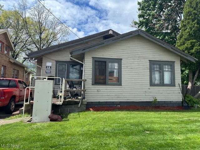 Great Investment on 0.26 acre lot!! New furnace in 2020. New roof in 2022. 3 bedroom ranch. Double lot 84 x 130. 2 car detached garage. Fenced in yard. Long term tenant rent is $590 on month-to-month basis. Tenant has been current in rent for several years and would like to stay. Basement with washer/dryer hook-ups. 2 car garage. Property is zoned mixed-used (MU-C). Selling in as is condition.