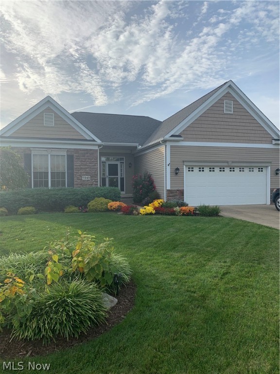 Looking for a ranch home that has it all??? This is IT! With a community clubhouse, pool and playground just across the street from the front door, and the gorgeous views at the back of the house of the Stark Parks Nature preserve & wetlands that start at the edge of the large back yard, you have a feeling of a little bit of country, while living minutes from popular restaurants, parks, universities, and shopping. From the back deck, you can watch an osprey fishing the wetlands, or watch a majestic heron slowly walking amongst the cat-tails. To the north side of the deck is green space that can never be built on, and it makes for just the right amount of sledding space in the winter time. The one owner Dutch Heritage home has all the modern must haves of corian countertops, an open concept, breakfast bar, large pantry space, vaulted ceilings, gas fireplace, and master ensuite that includes a large soaking tub. The large walk out basement area can easily be finished for additional