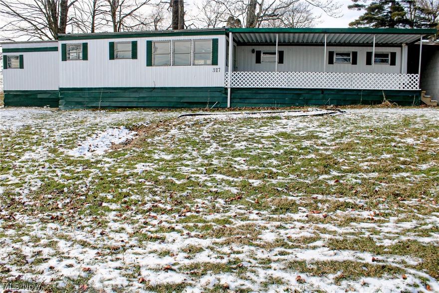 Welcome to 317 Harrison Ave. This property features 3 bedrooms with 1 bathroom. The home has all new LVP flooring and fresh paint throughout. Don't forget to take a look at the oversized garage!! Great opportunity for investment property or a new homeowner!