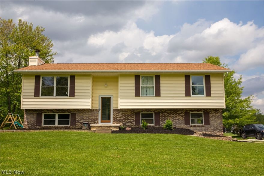 Welcome home! Built in 1994 and over 1,800+ square feet, this 3 bedroom, 1.5 bath 
bi-level is nestled on just over an acre on a beautiful landscape.  The upper level 
offers a large living room with newer laminate flooring (2016), a dining area open to 
the kitchen and a sliding glass door leading to the rear deck, a full bath, and all three 
bedrooms.  The lower level features, a half bath, utility room, a spacious family room 
with new modern laminate flooring (2017) , a fireplace, and a walk out into the over 
sized two car garage. The interior has been freshly painted, including white modern 
trim and new interior doors. Other upgrades include new hot water tank (2018), 
brand new water softener system (2018), new garage door (2018),and a new
deeper well and pump (2017). This home has been well cared for, is move in ready, 
and waiting for its new owner. Conveniently located between Rt. 94 and Rt. 57 in 
Wadsworth Township. Call today to schedule your showing.