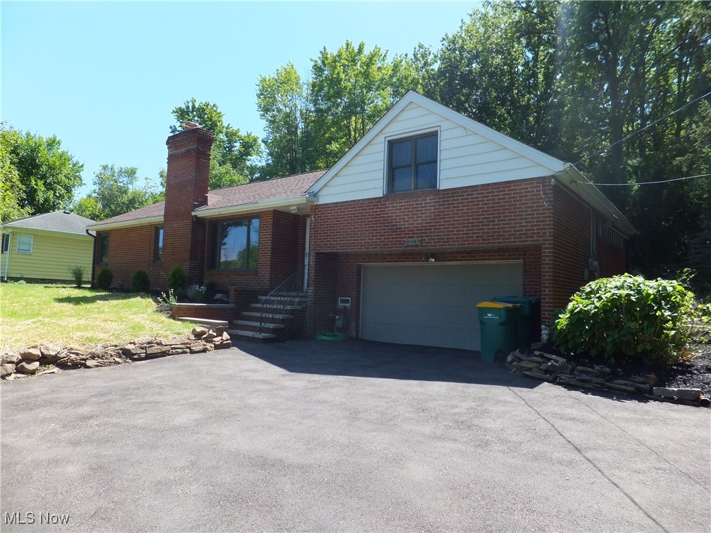 Charming Seven Hills Brick Cape Cod/Ranch style home, set on a park like 1.5-acre lot with a generous backyard for gatherings, gardening, or play, brick patio, 3 bedrooms 2 1/2 bathrooms, spacious living room, formal dining room, freshly painted interior, newer flooring, easy access to attic area for plenty of storage, brand new roof 1yr, 2 car attached garage w/opener, close to shopping, restaurants, and major highways, minutes to downtown