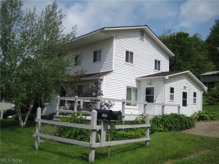 The Lake is Calling !!  This 4 bedroom, 1.5 bath all electric home offers lake views from 3 multiple levels decks. First floor master bedroom & laundry room. Public beach within walking distance. Kitchen appliances & bedroom furniture stay.  Life is better at the lake.