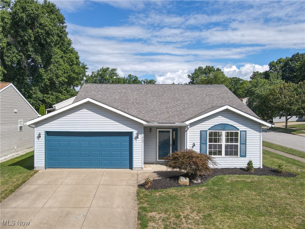 Welcome to this cozy ranch home in the heart of Cuyahoga Falls! Enter inside to a spacious great room with vaulted ceilings, offering plenty of room for a entertaining and seamless flow into the kitchen with a functional, open layout. The front room could be used as a dining space or sitting room. Head out to your private deck overlooking the partially fenced yard—perfect for relaxing or entertaining. The primary suite is a true retreat featuring French doors to the yard, a walk-in closet, and an en suite bath complete with double sinks and a stand-up shower. A second bedroom and full bath provide comfortable space for guests or family. You’ll also enjoy the convenience of a private laundry room and an attached two-car garage. This home combines comfort, functionality, and charm—ready for you to move right in!