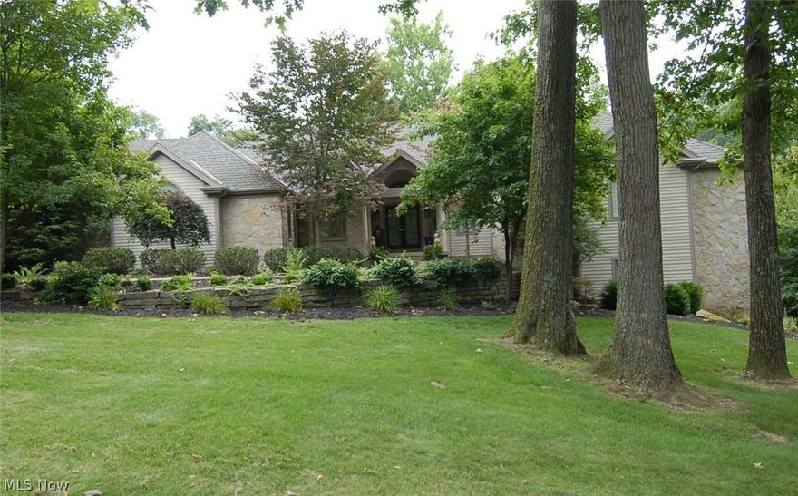 Unique stone and wood multi level home with open floor plan. Top of line quality in fixtures and appliances. Stainless steel thermador 6 burner gas range top, 2 deluxe wall ovens plus warming drawer, dishwasher, 2 sinks, 2 garbage disposals, one wine refrigerator, stainless steel thermador refrigerator, serving and butler service quarters, vaulted ceilings, eat-in separate room overlooking decks, inground swimming pool, patio, 4th bedroom has private bath and sitting room. Master suite updated with new bath and sitting room.